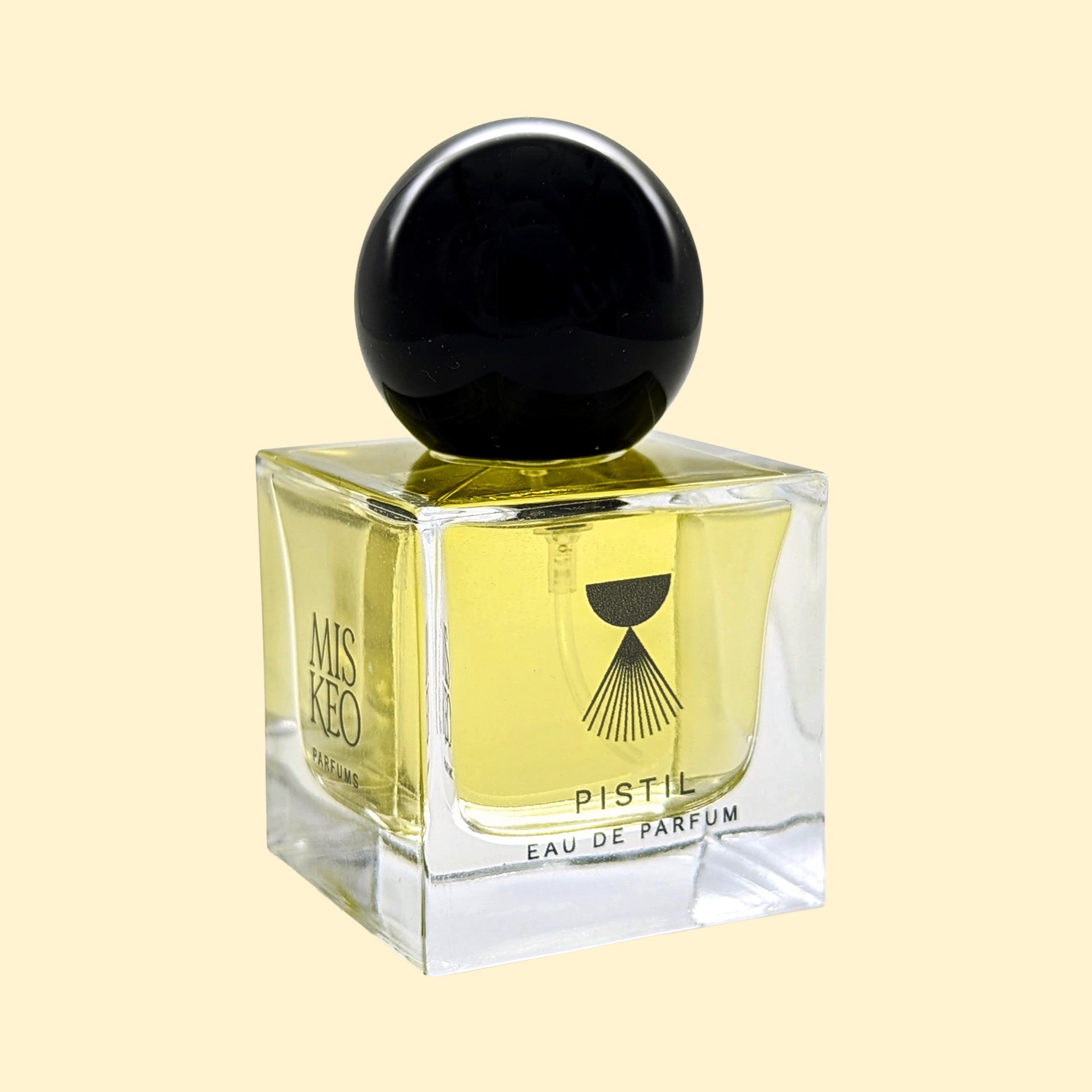 MISKEO Parfums Pistil Eau de Parfum-flesje met een glanzende zwarte bolvormige dop en een gouden geur.