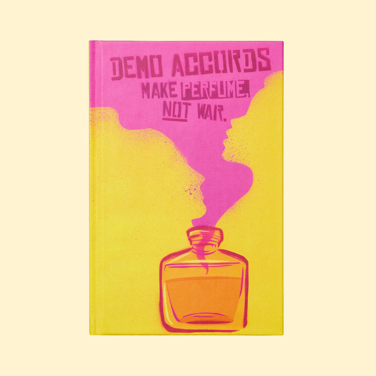 "Demo Accords: Make Perfume Not War” book with a pink-and-yellow cover featuring two profiles and a perfume bottle.