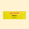 Demo Accords eau de parfum sample set with nine 2 ml fragrances in bright yellow and pink packaging.