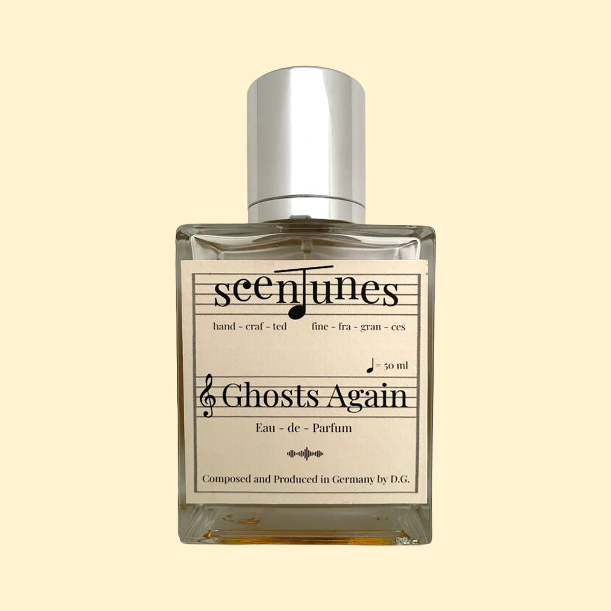 scenTunes Ghosts Again Eau de Parfum 50 ml in een glazen flacon met zilverkleurige dop en crèmekleurig etiket.